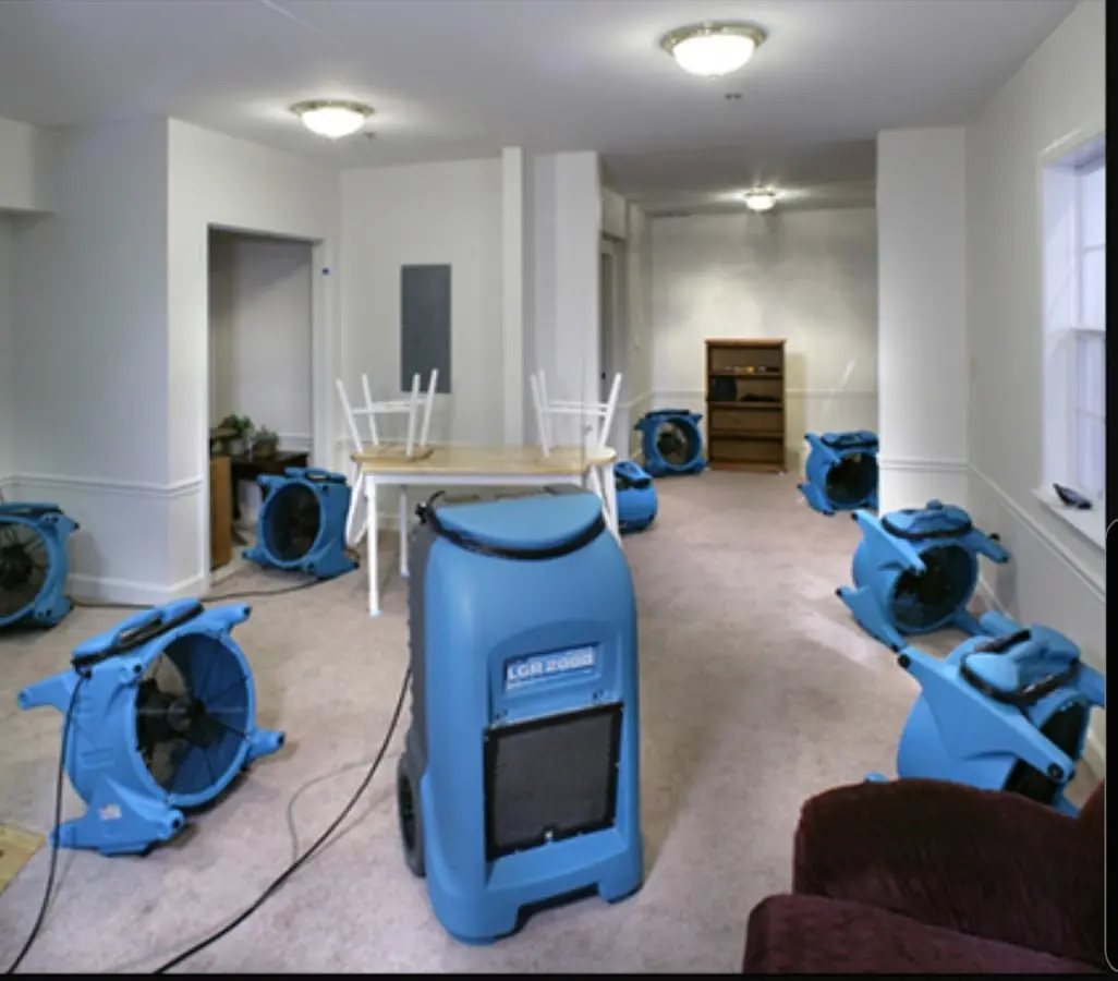Air movers and dehumidifier setup for Water Extraction & Removal in Landen